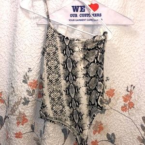 Pretty little thing snake skin bodysuit